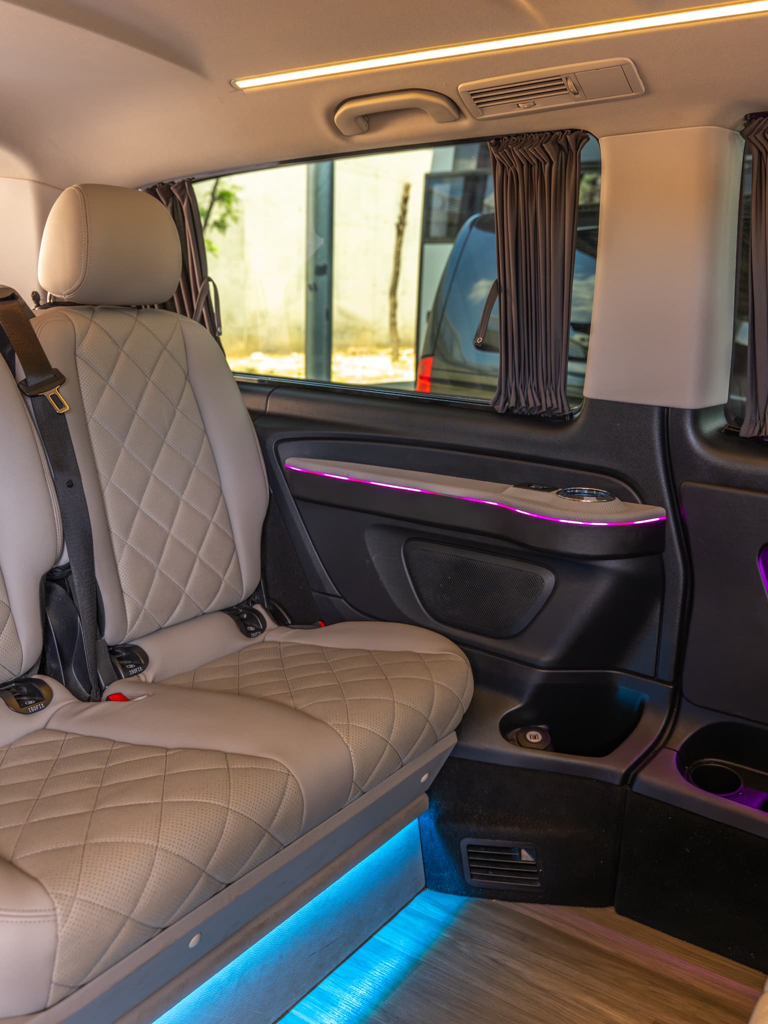 VIP Vito interior — quilted leather captain's seats and ambient lighting
